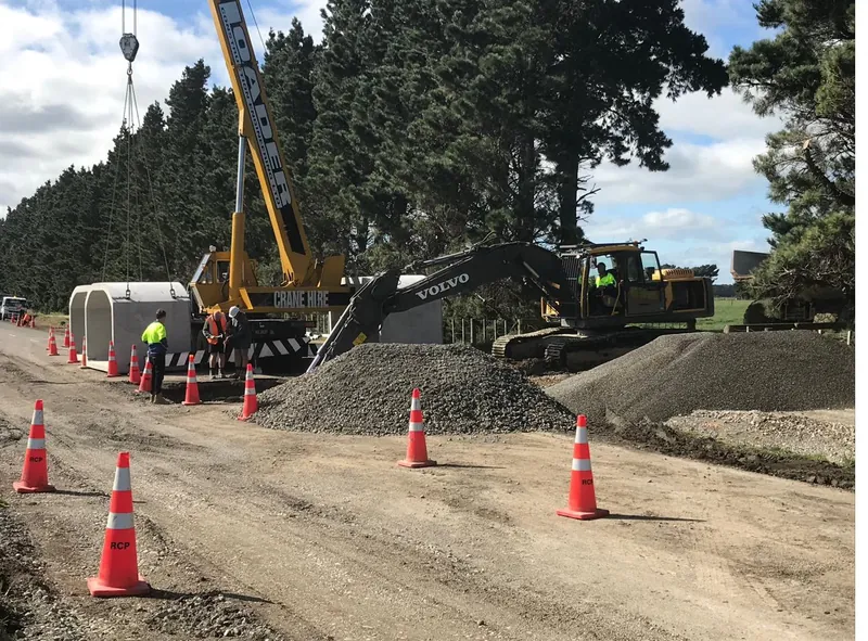 Lifting a large culvert into place